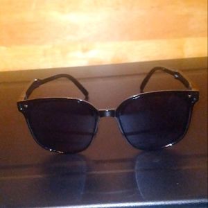 Folding pair of sunglasses
